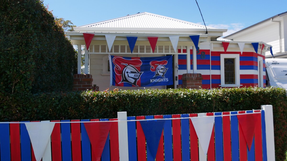 Newcastle buildings painted red and blue as Knights chase grand final glory